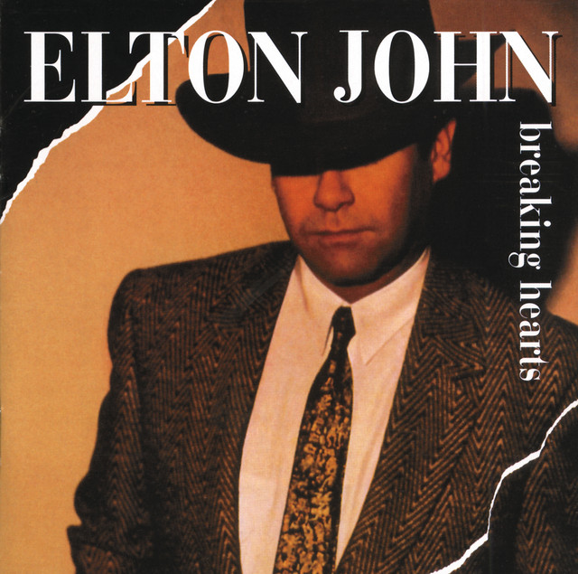 کاور آهنگ Slow Down Georgie (She's Poison) از Elton John